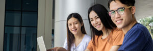 A group of college students studying together in the common area of a residence hall